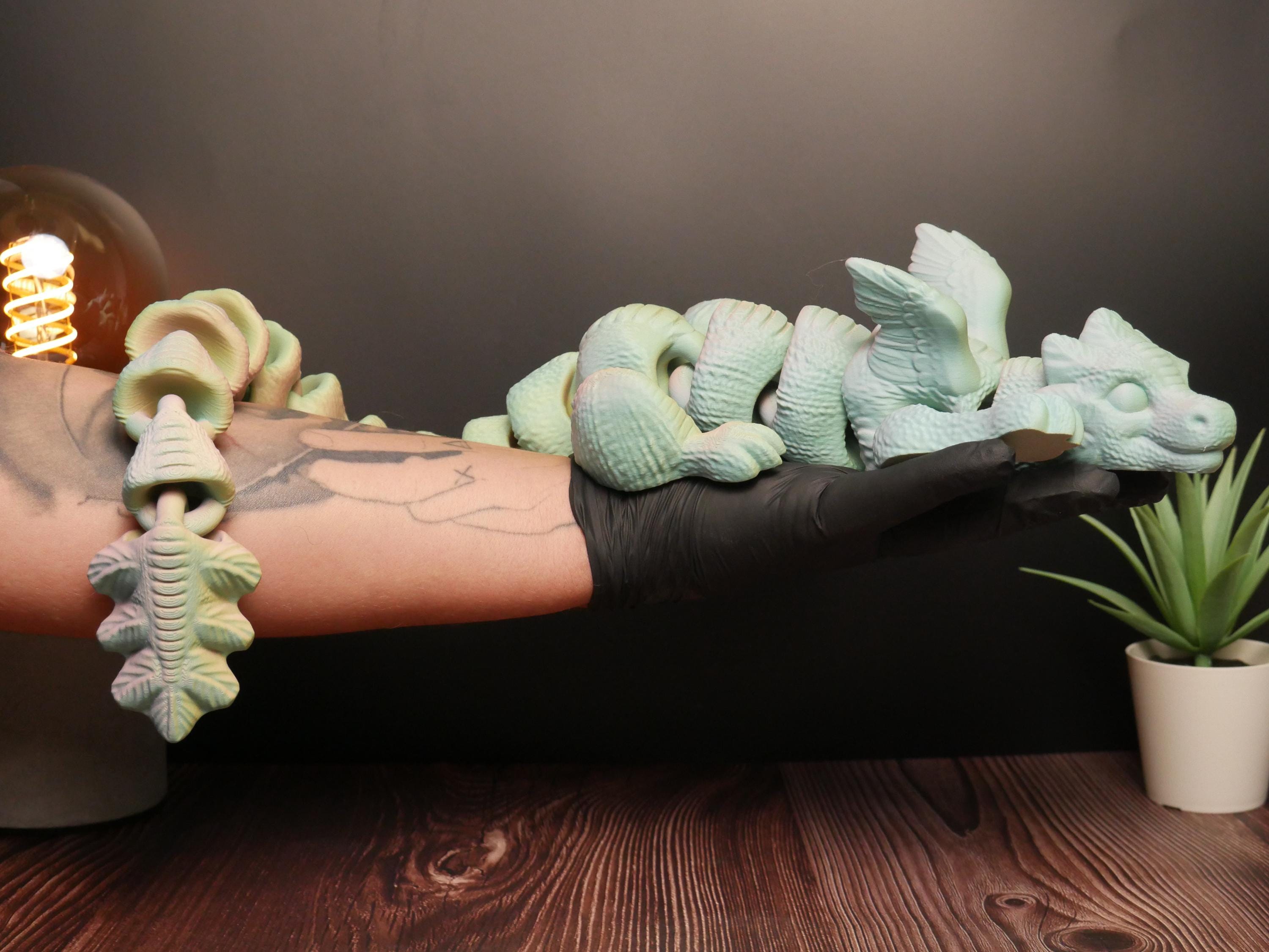 Dragón articulado flexible y multifuncional: juguete antiestrés, decoración creativa y coleccionable único para entusiastas.