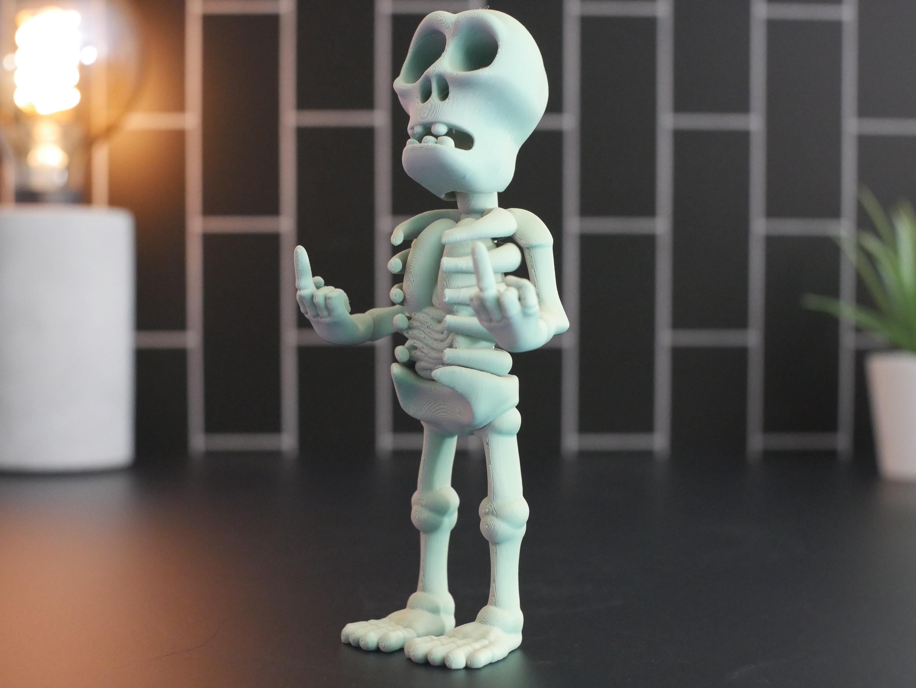 Esqueleto articulado con dedo medio: regalo perfecto para una decoración divertida y única