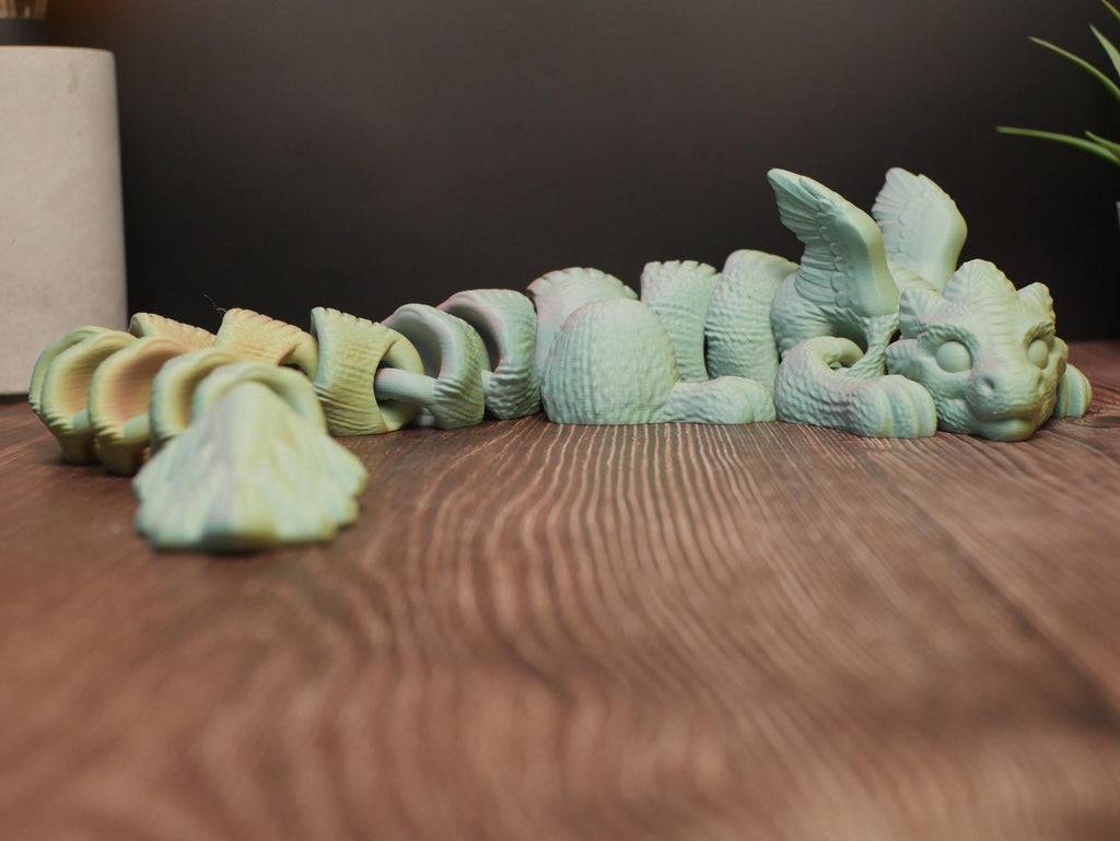 Dragón articulado flexible y multifuncional: juguete antiestrés, decoración creativa y coleccionable único para entusiastas.