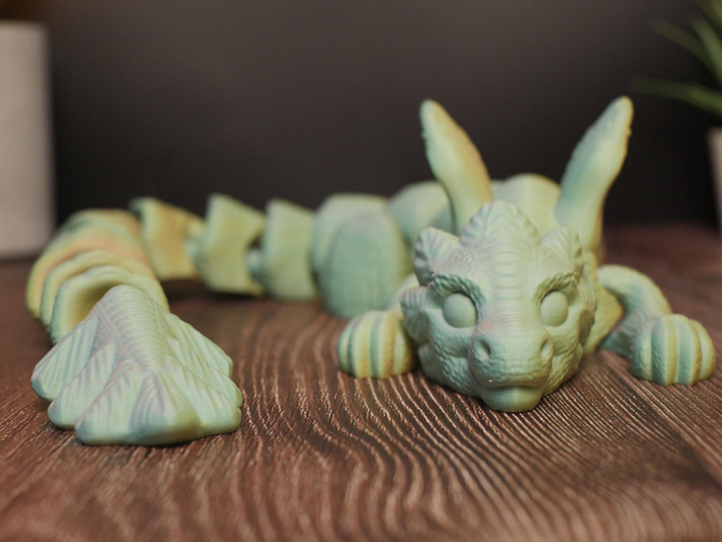 Dragón articulado flexible y multifuncional: juguete antiestrés, decoración creativa y coleccionable único para entusiastas.