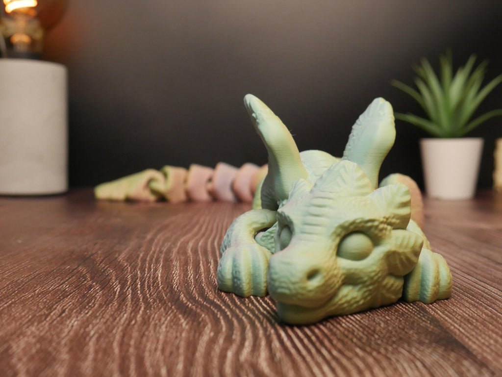 Dragón articulado flexible y multifuncional: juguete antiestrés, decoración creativa y coleccionable único para entusiastas.