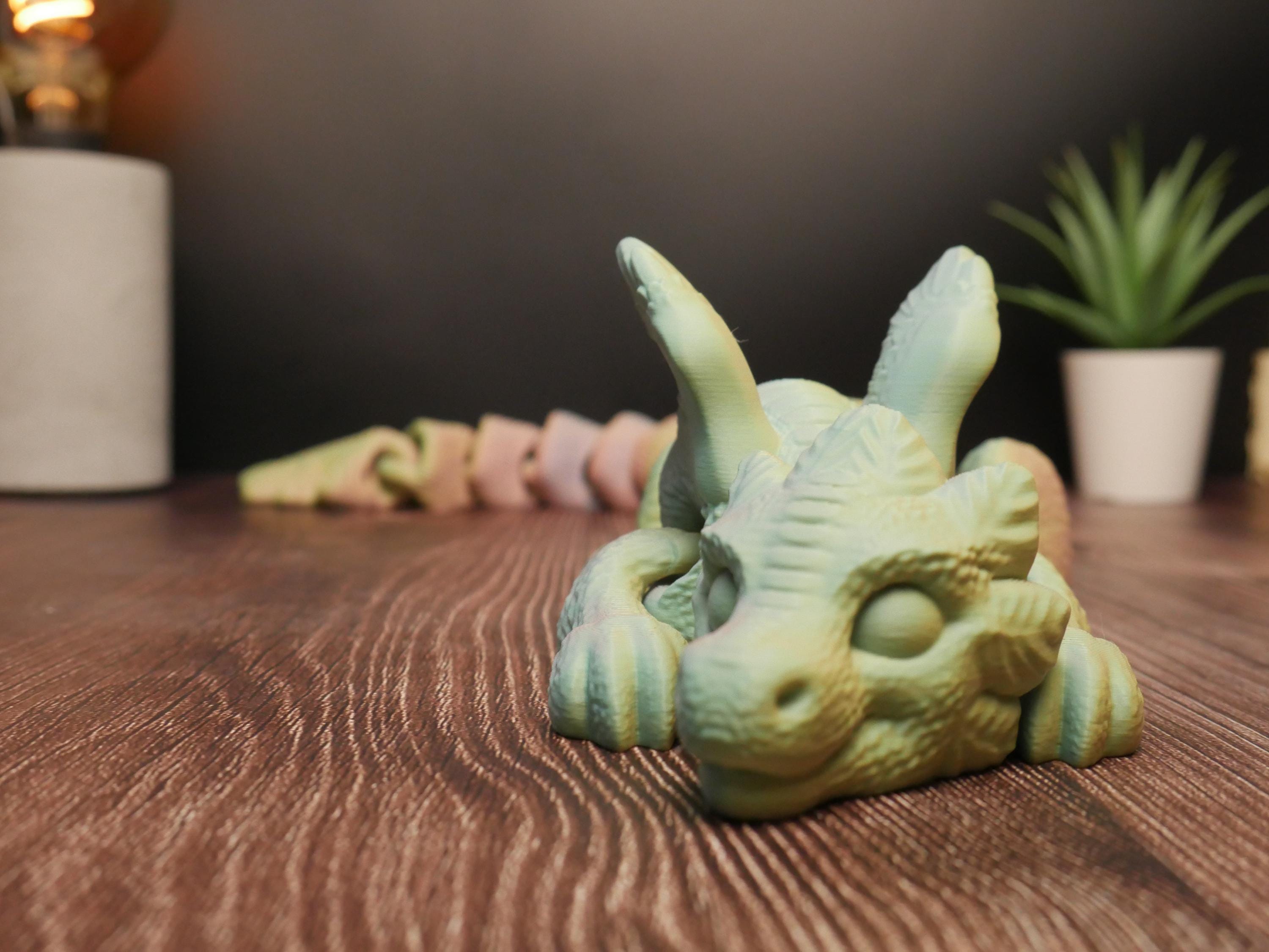 Dragón articulado flexible y multifuncional: juguete antiestrés, decoración creativa y coleccionable único para entusiastas.