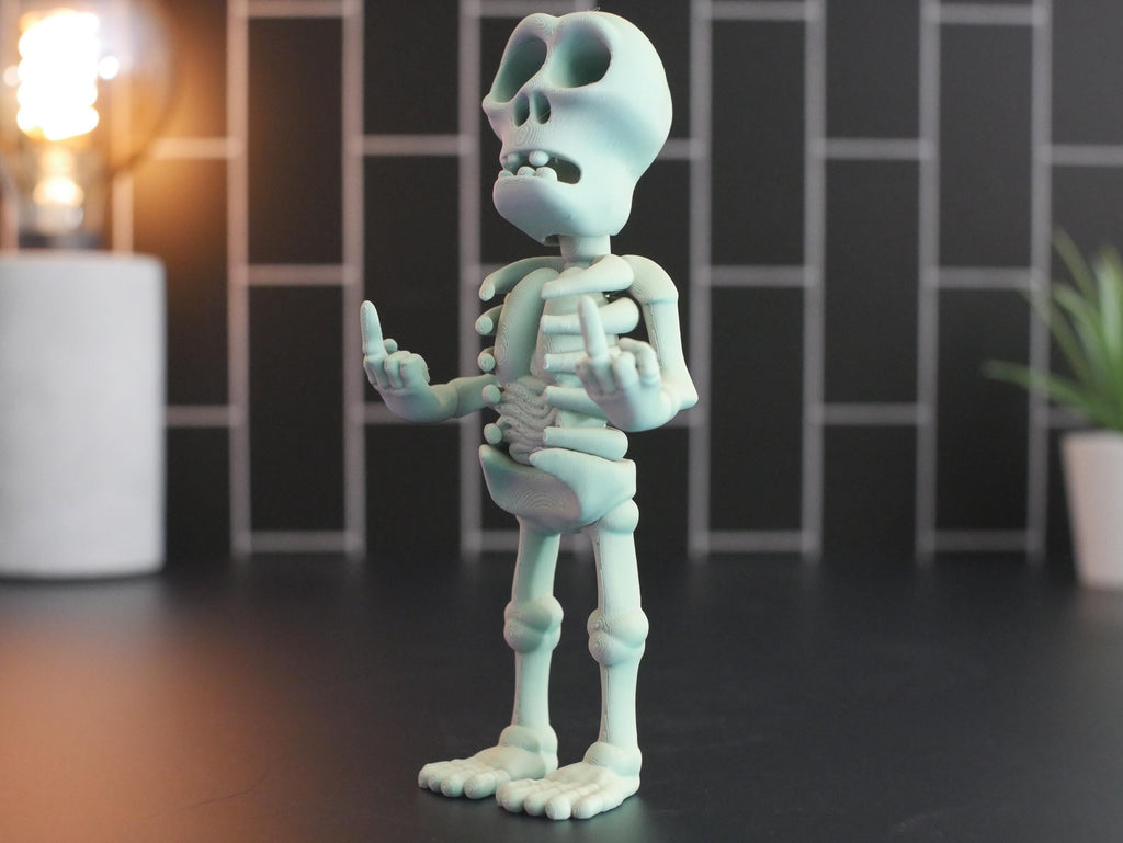 Esqueleto articulado con dedo medio: regalo perfecto para una decoración divertida y única