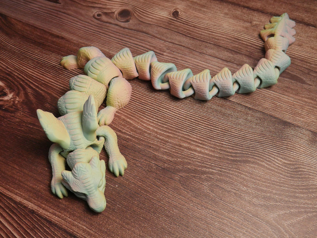 Dragón articulado flexible y multifuncional: juguete antiestrés, decoración creativa y coleccionable único para entusiastas.