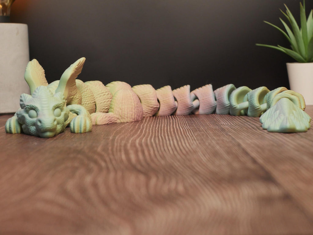 Dragón articulado flexible y multifuncional: juguete antiestrés, decoración creativa y coleccionable único para entusiastas.